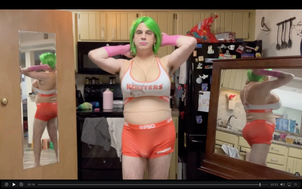 Sexy tranny models her new Hooters outfit